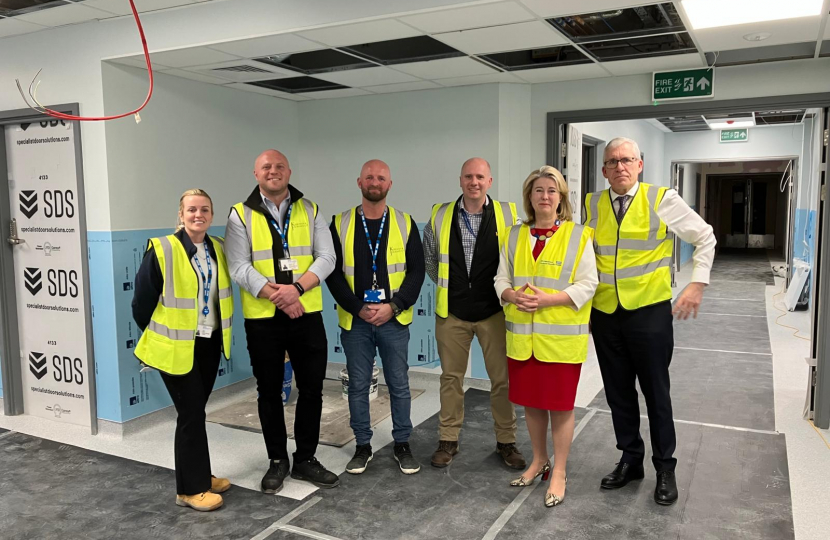 Anna Firth with Andrew Pike and the contractors in the new A&E wing