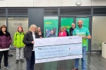 Anna and James present cheque to Southend Samaritans 